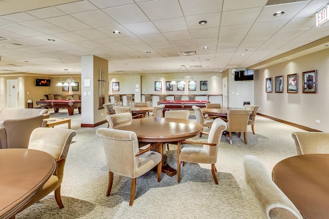 dining space with light carpet, billiards, visible vents, and baseboards