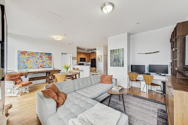 living area with light wood-style flooring