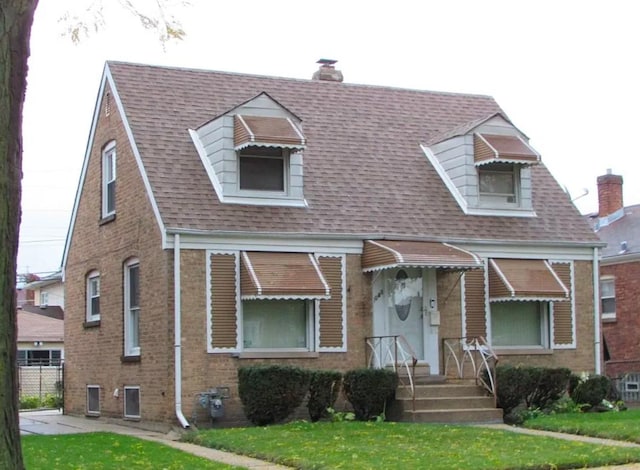 view of front of home with a front yard