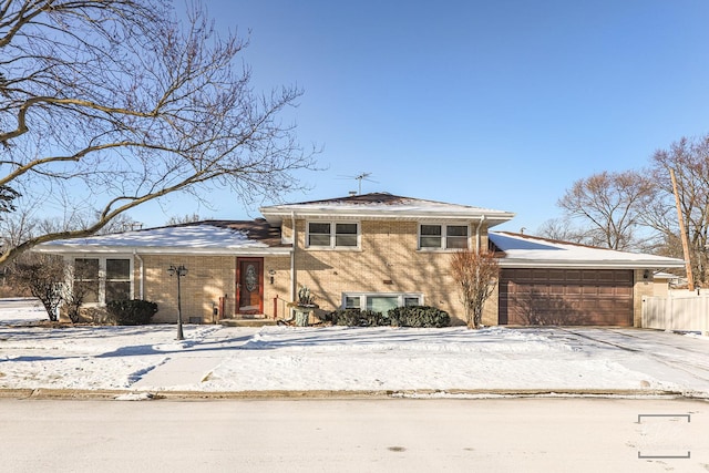 split level home with a garage