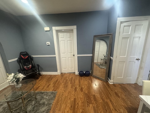 interior space with dark hardwood / wood-style floors