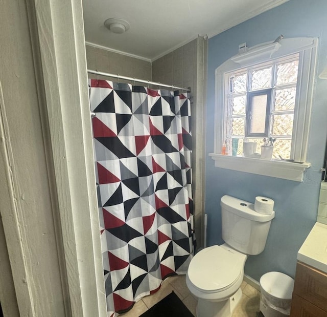 bathroom featuring tile patterned flooring, vanity, ornamental molding, a shower with curtain, and toilet