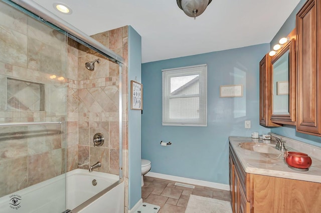 full bathroom with vanity, enclosed tub / shower combo, and toilet