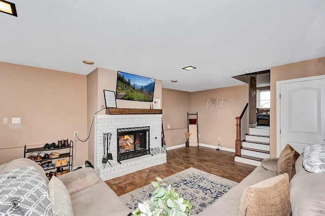 living room featuring a fireplace