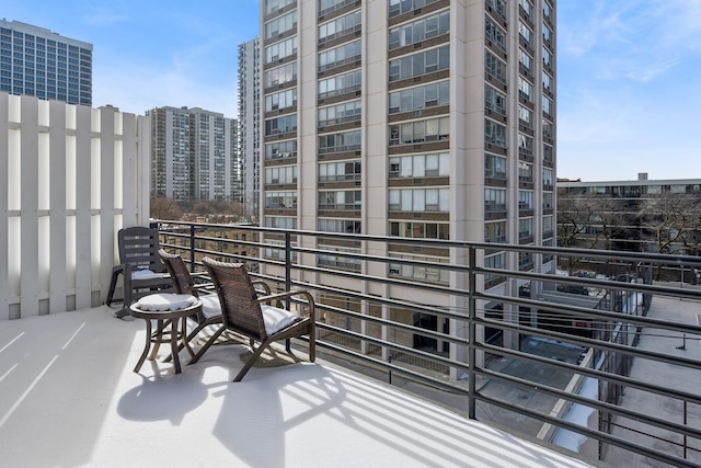 balcony featuring a city view