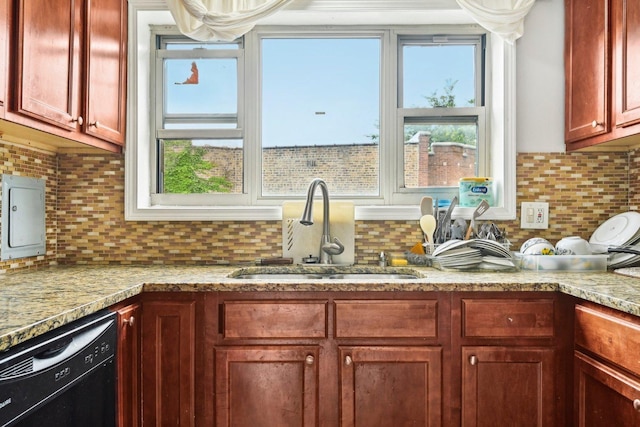 kitchen featuring sink, decorative backsplash, a wealth of natural light, and dishwasher