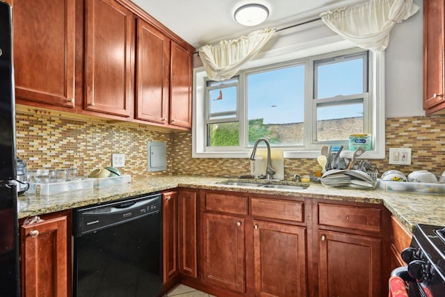 kitchen with tasteful backsplash, light stone countertops, sink, and black appliances