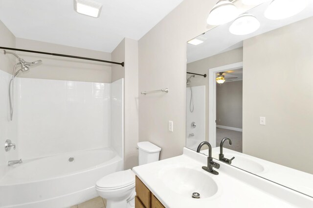 bathroom featuring  shower combination, vanity, and toilet