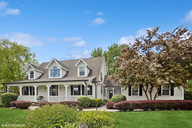 37580 N Fairfield Rd, Lake Villa, IL 60046 - cape cod home featuring a porch, a front lawn, and a shingled roof