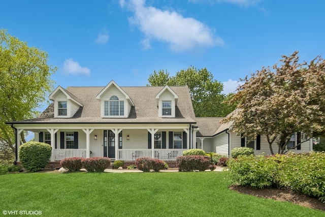 37580 N Fairfield Rd, Lake Villa, IL 60046 - cape cod house featuring a front yard, covered porch, and a shingled roof