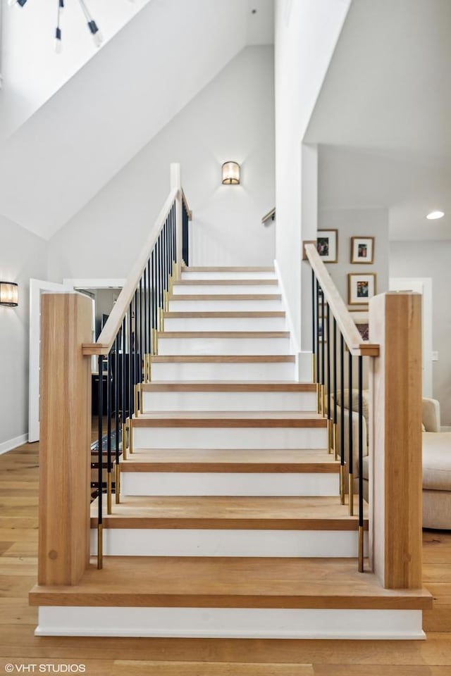 37580 N Fairfield Rd, Lake Villa, IL 60046 - stairs with wood finished floors, recessed lighting, high vaulted ceiling, and baseboards