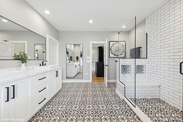 37580 N Fairfield Rd, Lake Villa, IL 60046 - full bathroom with double vanity, a stall shower, baseboards, and recessed lighting