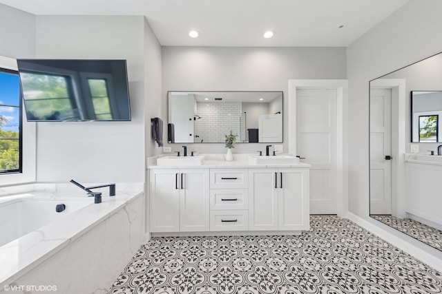 37580 N Fairfield Rd, Lake Villa, IL 60046 - full bathroom with a garden tub, a stall shower, double vanity, and recessed lighting