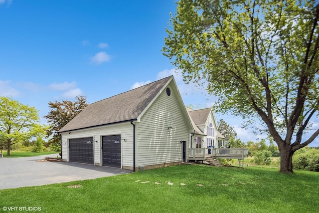 37580 N Fairfield Rd, Lake Villa, IL 60046 - view of side of home with a wooden deck, a yard, a garage, and roof with shingles