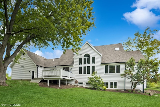 37580 N Fairfield Rd, Lake Villa, IL 60046 - rear view of house featuring a shingled roof, a wooden deck, and a yard