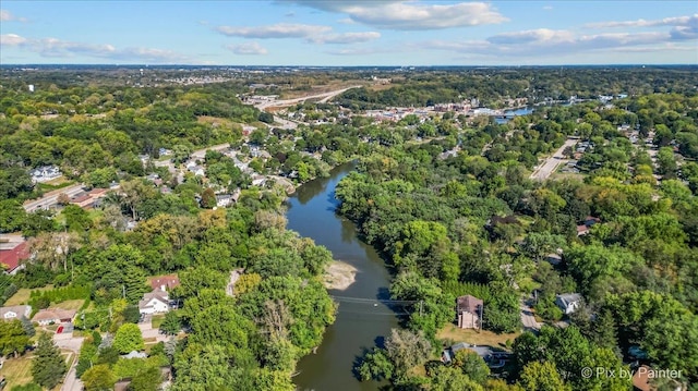 bird's eye view featuring a water view and a view of trees