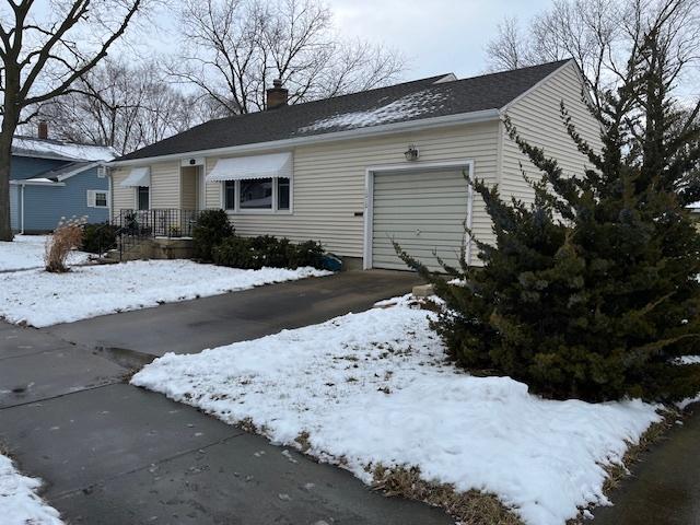 exterior space with a garage