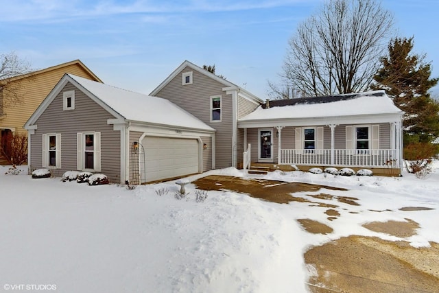 view of property featuring a garage and a porch