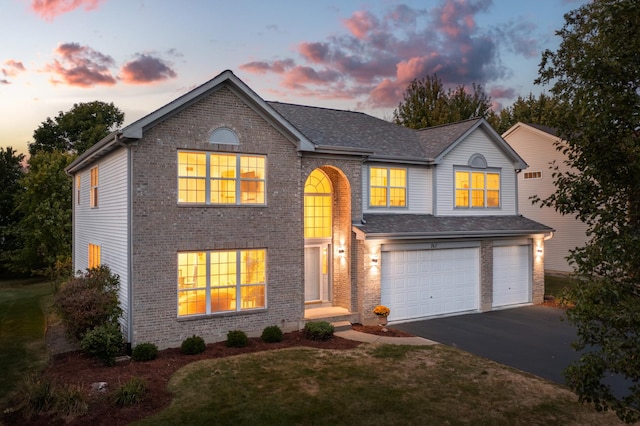 view of front of house with a garage