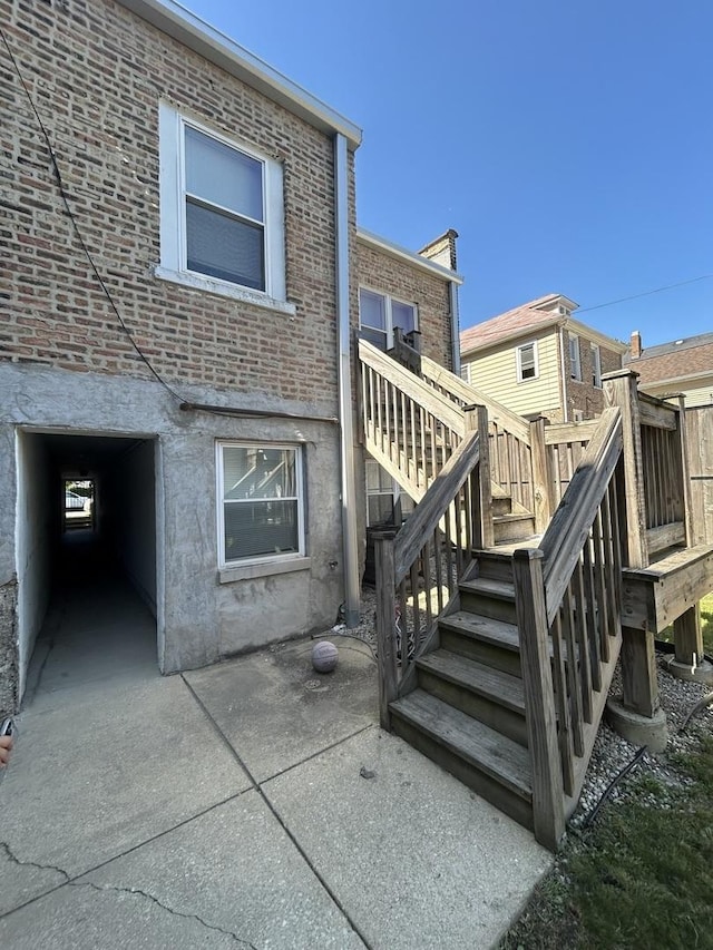 back of property featuring a patio area