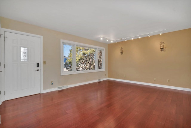 foyer featuring hardwood / wood-style floors