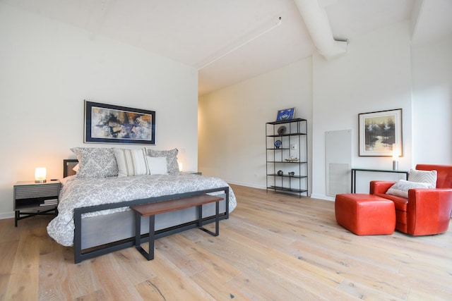 bedroom with light hardwood / wood-style floors