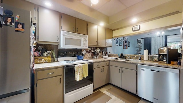 803 Irvine Rd Unit 803, Champaign, IL 61822 - kitchen with appliances with stainless steel finishes, light countertops, backsplash, and recessed lighting