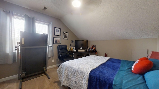 803 Irvine Rd Unit 803, Champaign, IL 61822 - bedroom featuring a textured ceiling, carpet floors, and vaulted ceiling