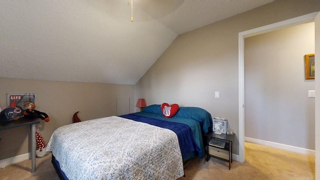 803 Irvine Rd Unit 803, Champaign, IL 61822 - bedroom with light carpet, lofted ceiling, and a textured ceiling