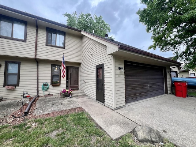 803 Irvine Rd Unit 803, Champaign, IL 61822 - view of front of property with an attached garage and asphalt driveway