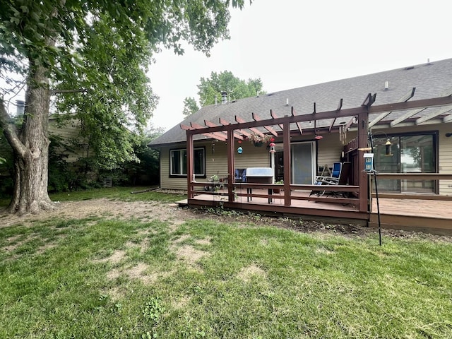 803 Irvine Rd Unit 803, Champaign, IL 61822 - rear view of property featuring a pergola, a wooden deck, and a lawn