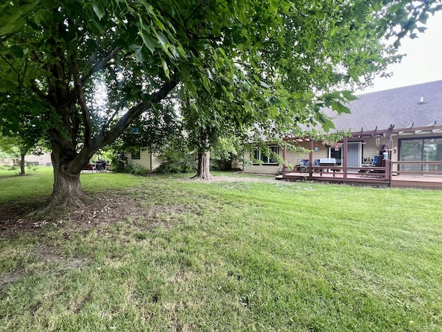 803 Irvine Rd Unit 803, Champaign, IL 61822 - view of grassy yard featuring a deck and a pergola
