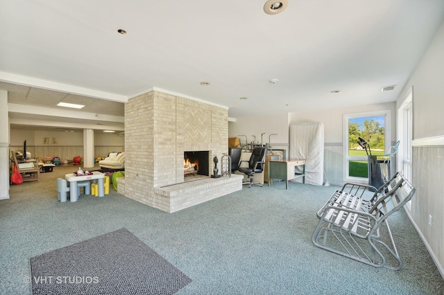 carpeted living room featuring a brick fireplace