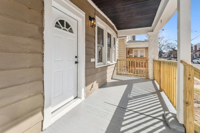 entrance to property with covered porch