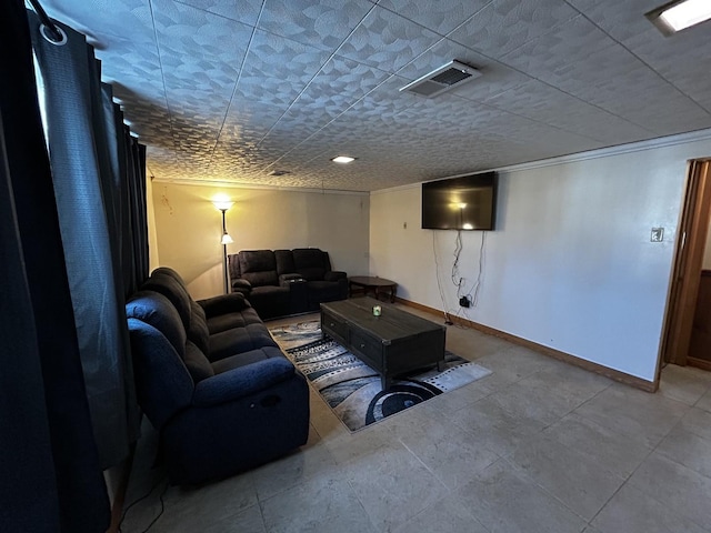 living area featuring visible vents and baseboards