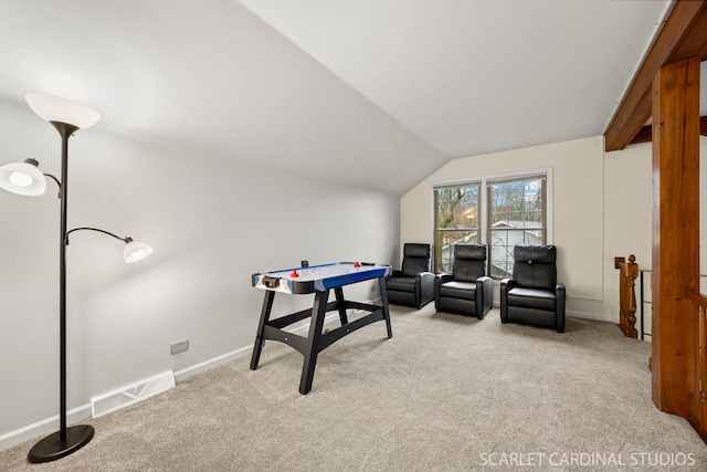 rec room featuring lofted ceiling, carpet, visible vents, and baseboards