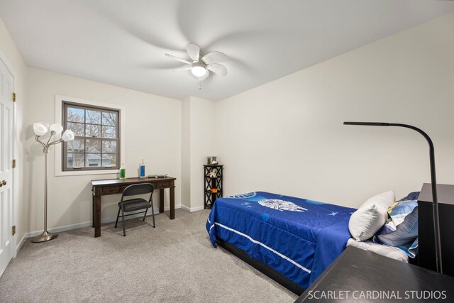 bedroom featuring carpet, baseboards, and ceiling fan