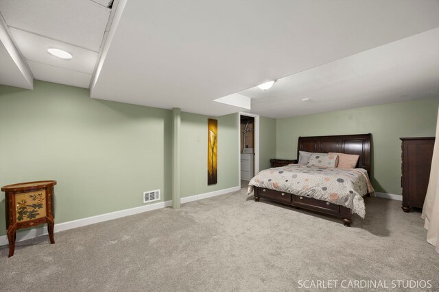 bedroom with carpet, baseboards, and visible vents