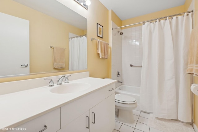 full bathroom featuring tile patterned flooring, vanity, shower / bath combo, and toilet