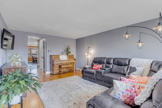 living room with light hardwood / wood-style floors