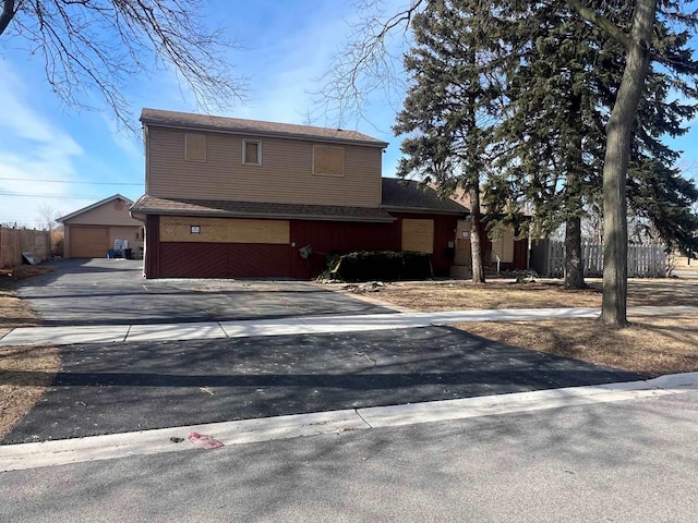 front of property with a garage