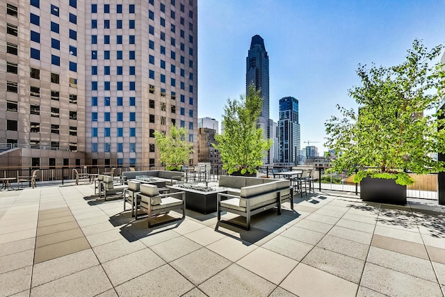 view of patio featuring a fire pit