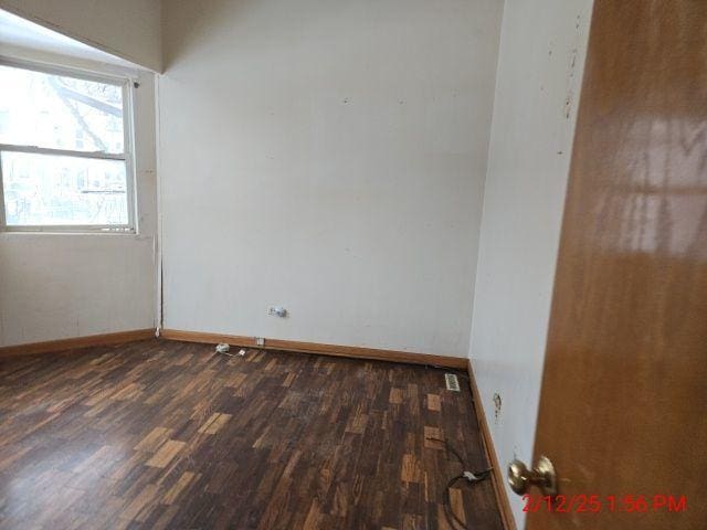 1838 S Springfield Ave Unit A, Chicago, IL 60623 - spare room with dark hardwood / wood-style flooring