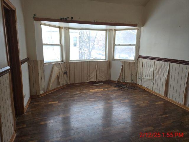 1838 S Springfield Ave Unit A, Chicago, IL 60623 - spare room with dark hardwood / wood-style floors