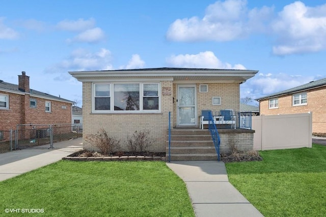 view of front of property with a front lawn