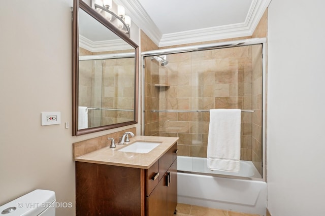 bathroom featuring toilet, vanity, crown molding, and shower / bath combination with glass door