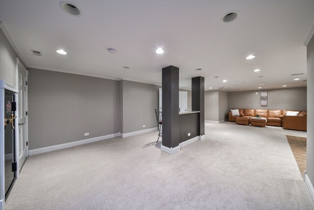 unfurnished living room featuring light colored carpet