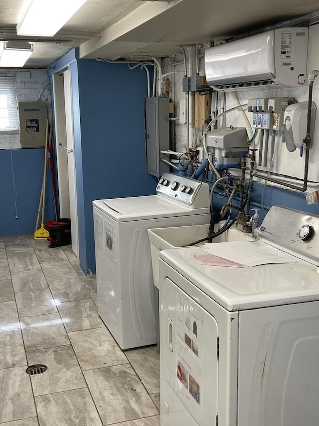 laundry room featuring separate washer and dryer and electric panel