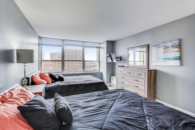 bedroom featuring multiple windows