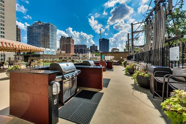 view of patio / terrace featuring area for grilling and exterior kitchen